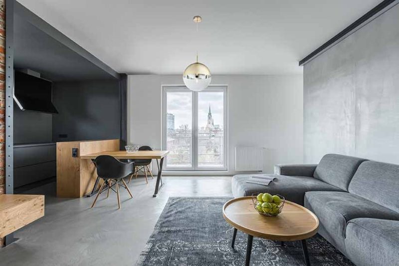 Gray living room with balcony